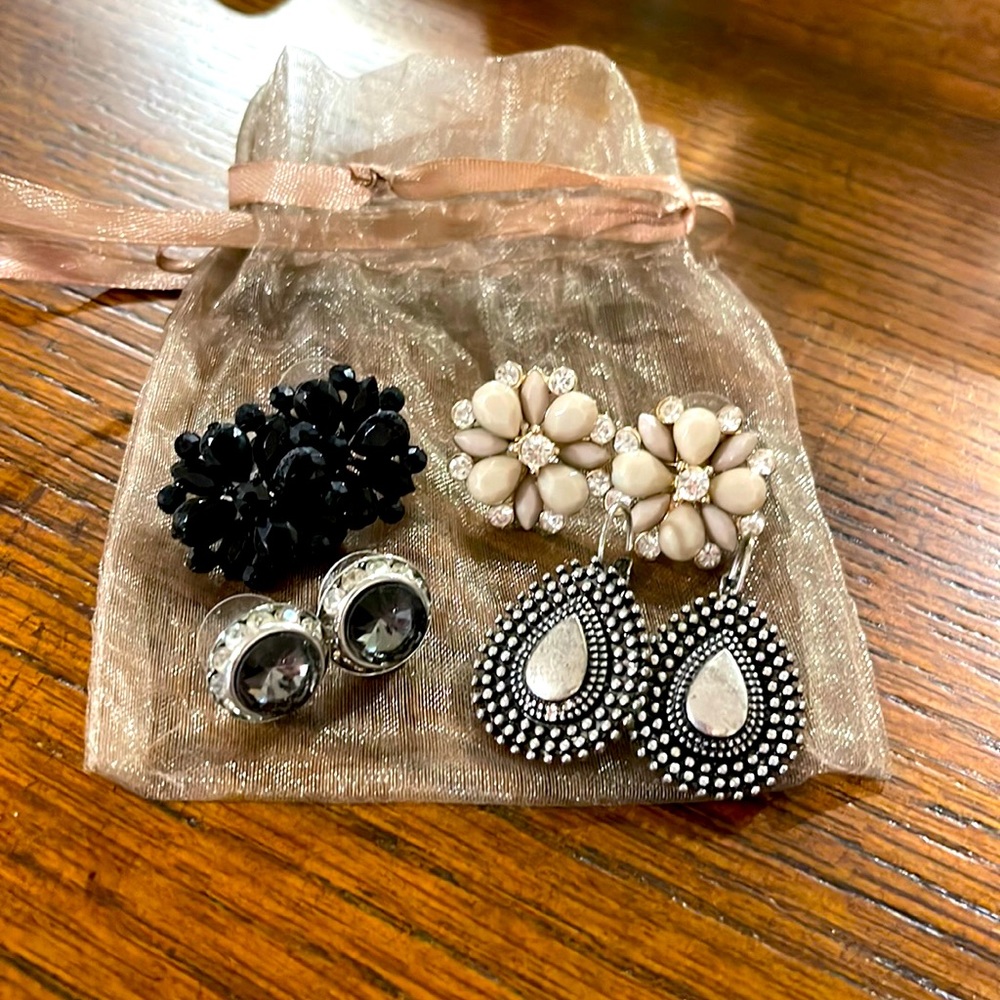4 pairs of earrings, 3 post and 1 dangle.